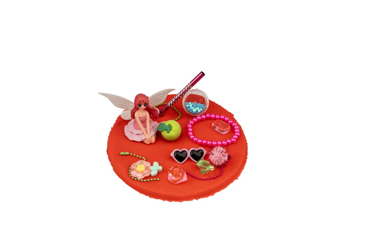 Fairy doh scene with a fairy and beads
