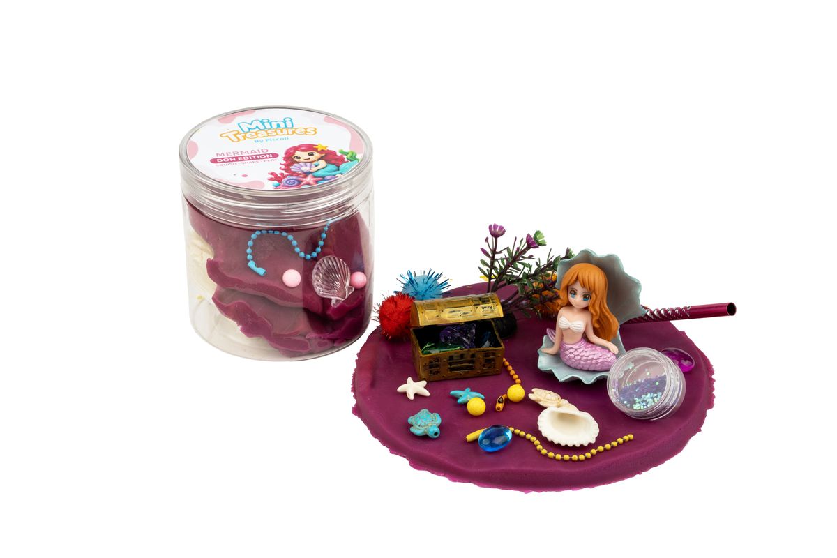 Mermaid tub opened: plum doh, a mermaid, a treasure chest and shells