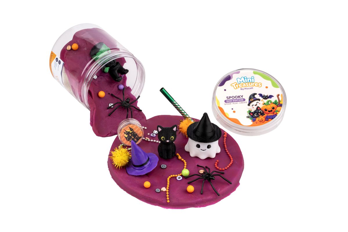 Spooky tub tipped open with a ghost and a cat